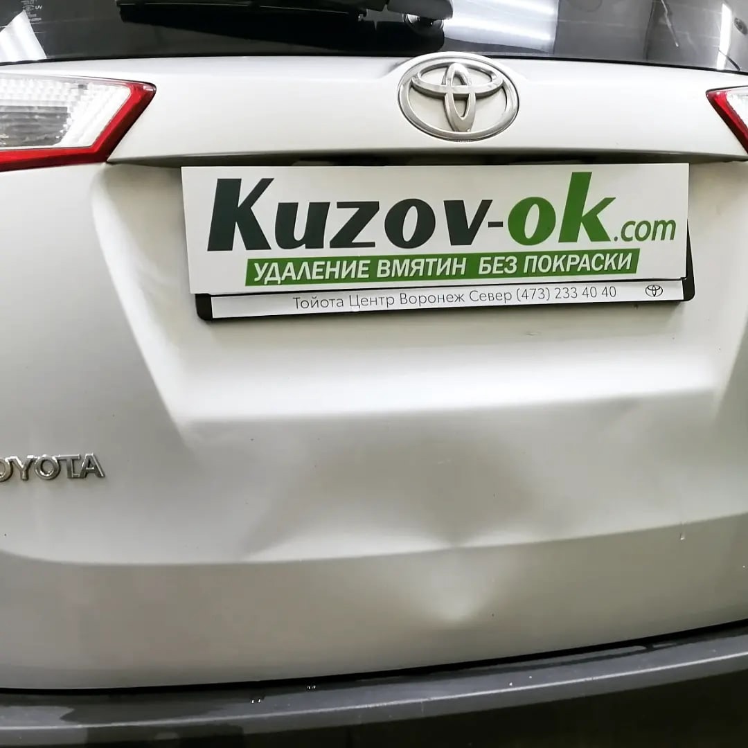 Kuzov-ok.com Удаление вмятины на багажнике Toyota RAF4